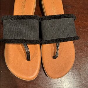 Andre Assous Black and Tan Fringe Sandals